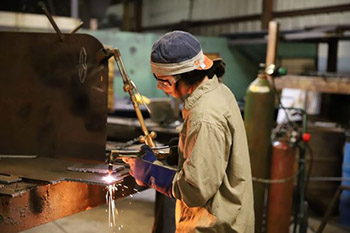 Welding student practicing